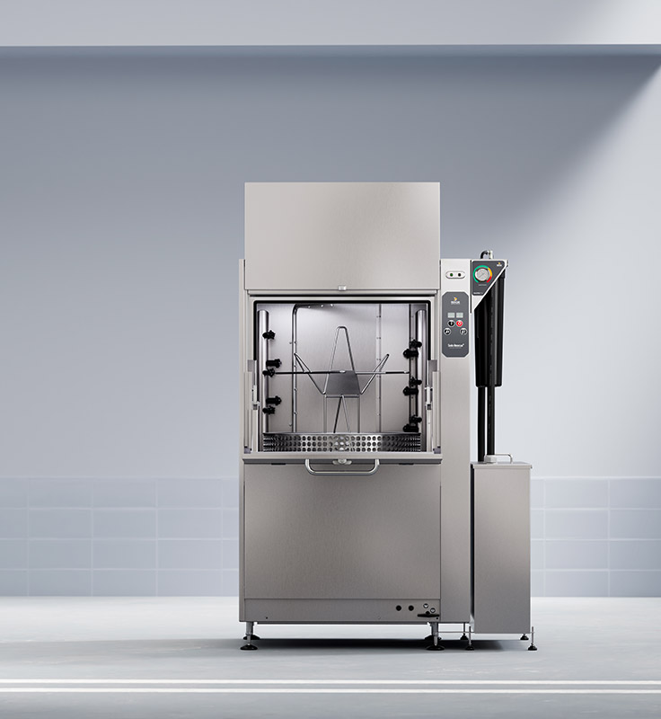 Open industrial gear washer with visible washing chamber and filter system on the right side with control panel.